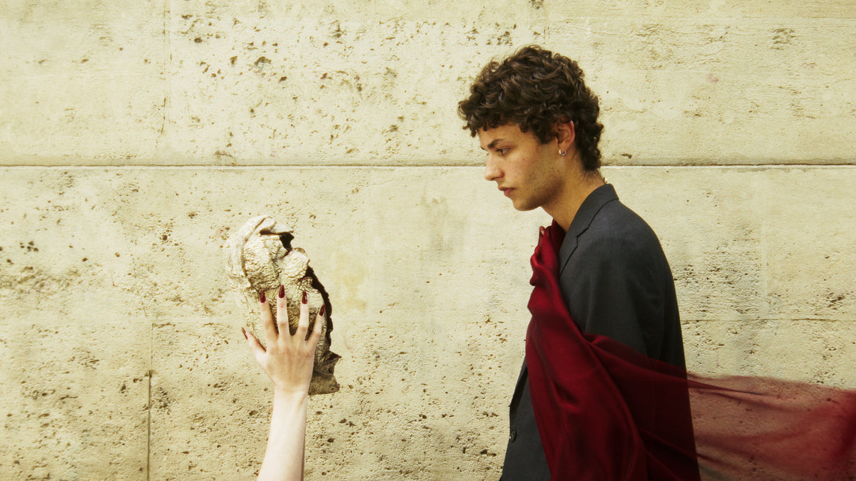 Adelina Bernard pre-campaign Like the Peeling of a Pomegranate man facing hollow skull sculpture