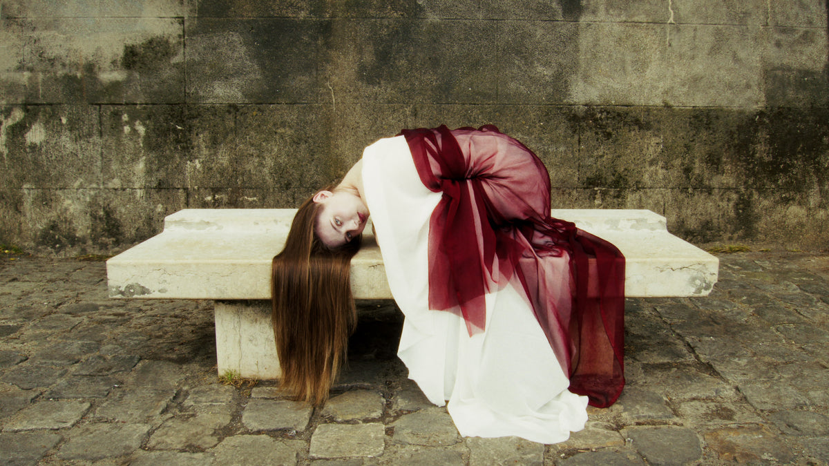 Adelina Bernard pre-campaign Like the Peeling of a Pomegranate figure in red draped fabric