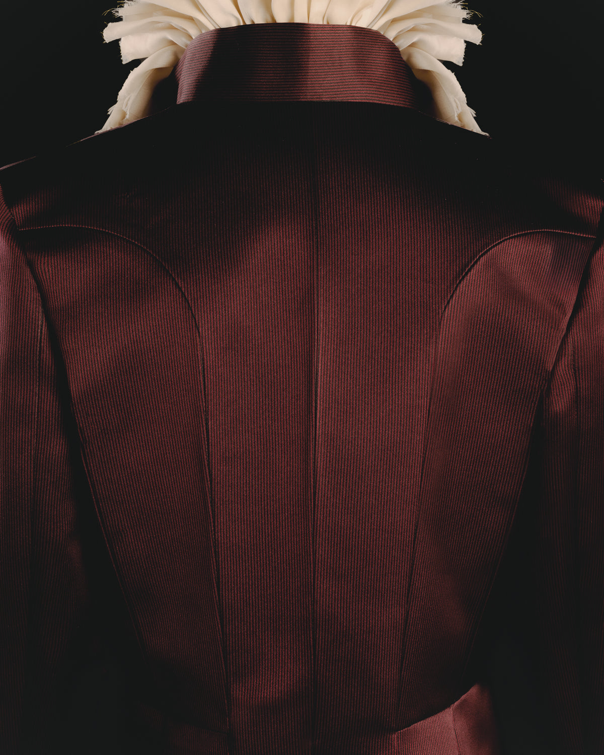 Adelina Bernard SS25 Pulling Strings campaign close-up back of striped master jacket with ruffle collar